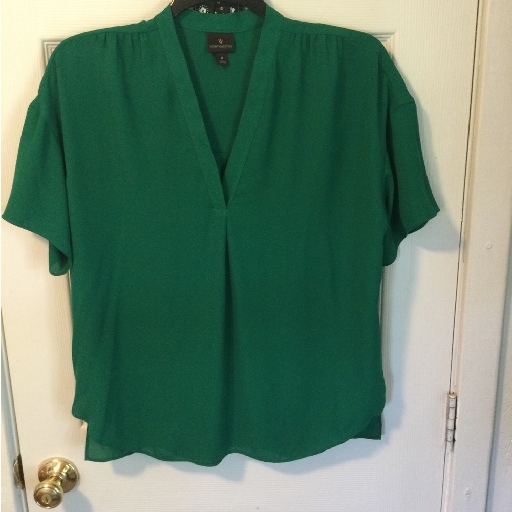 Worthington emerald green gauze type material.